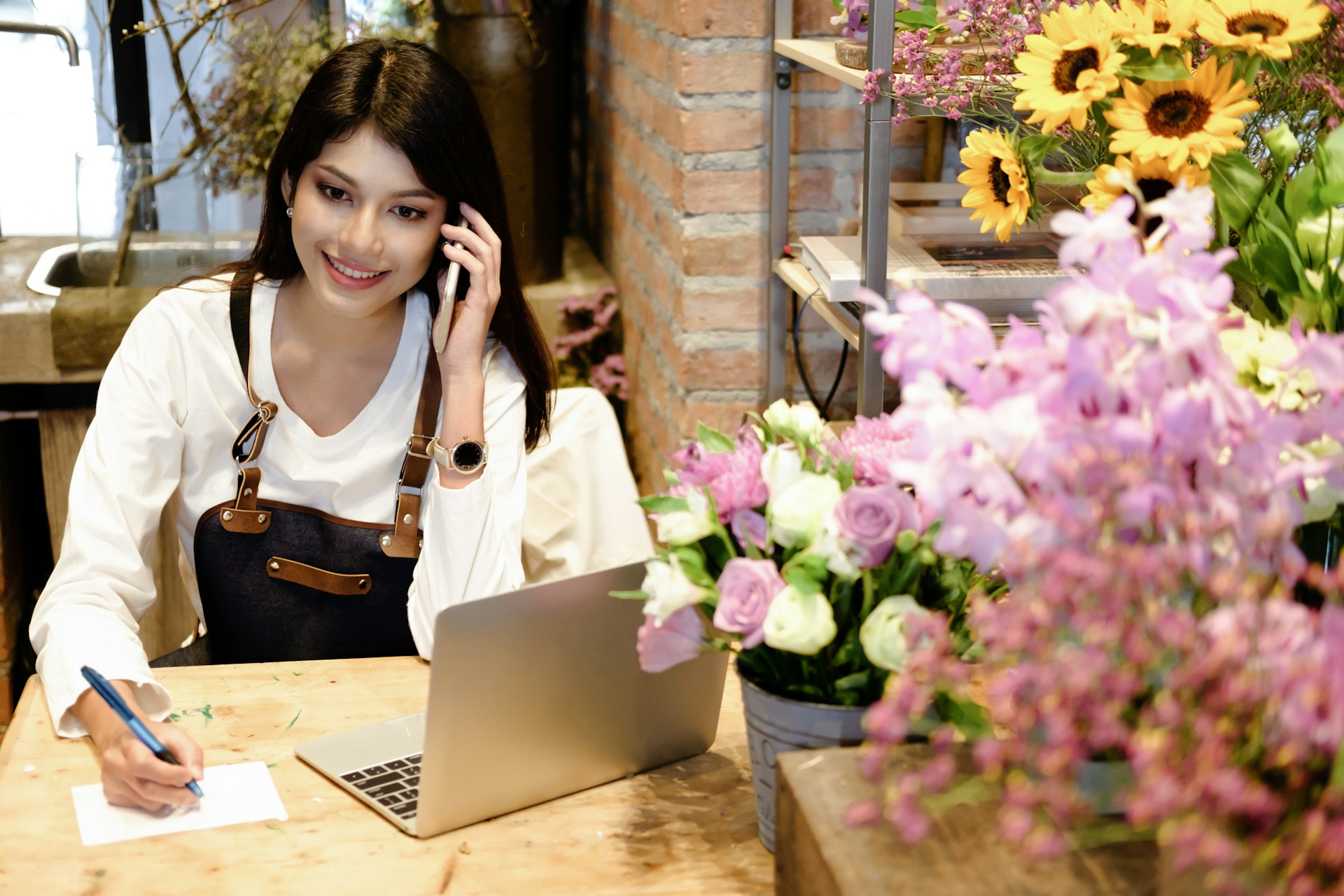 Small business owner working in her shop